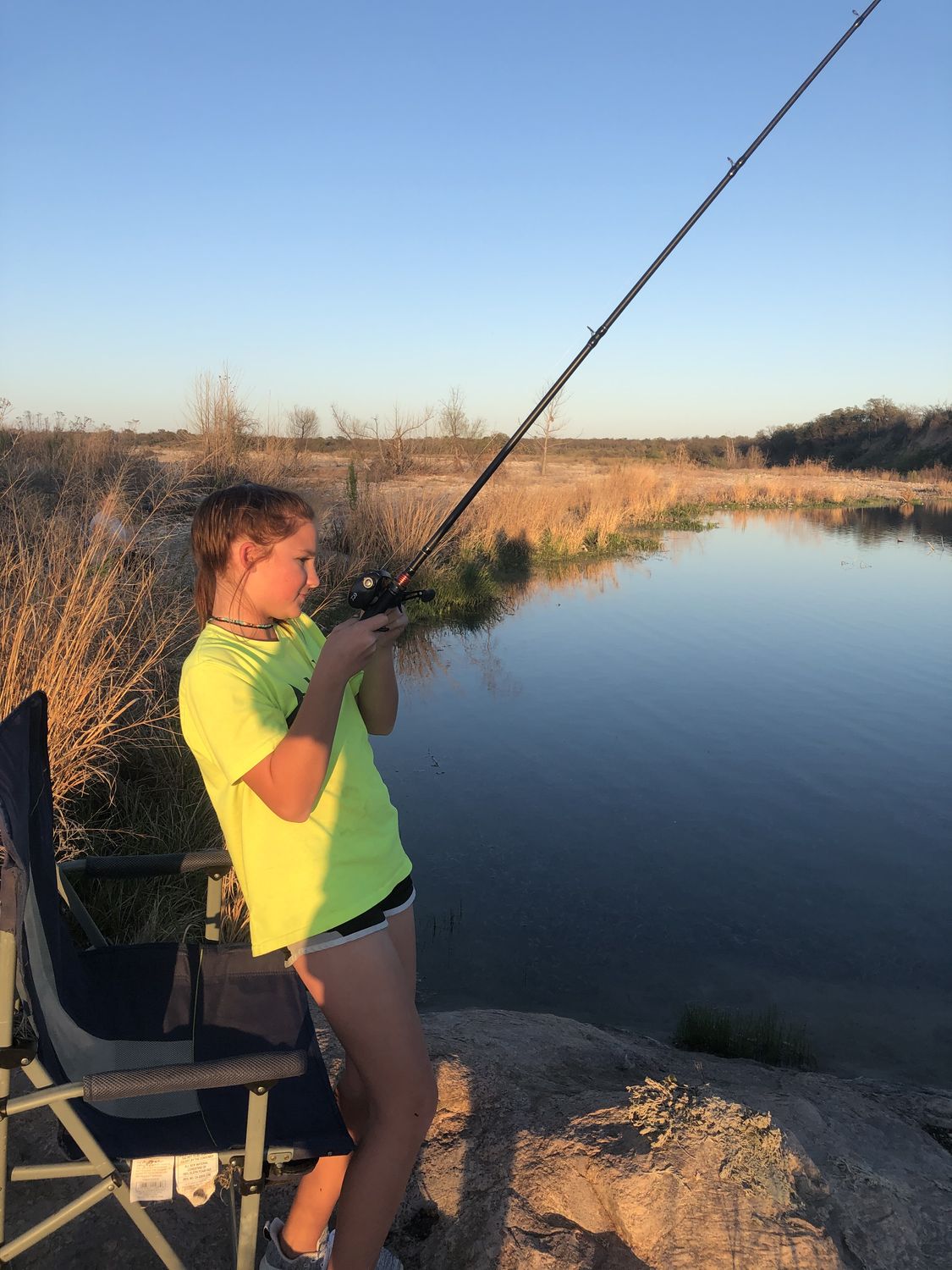 Fishing the tank at camp in the evening