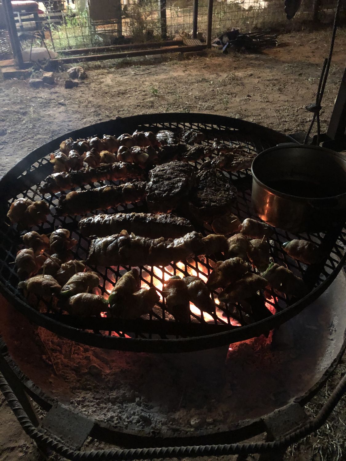 Dinner coming together over the fire