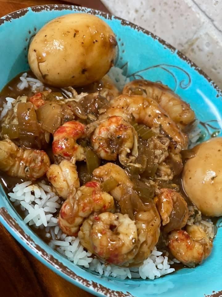 Shrimp and potatoes over rice
