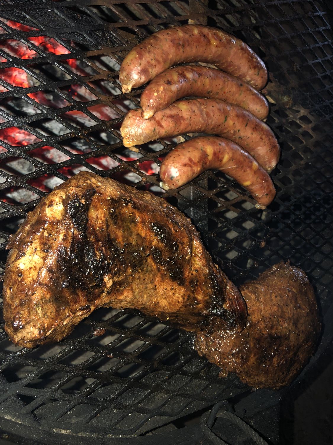 Sausage and smoked turkey on the grate
